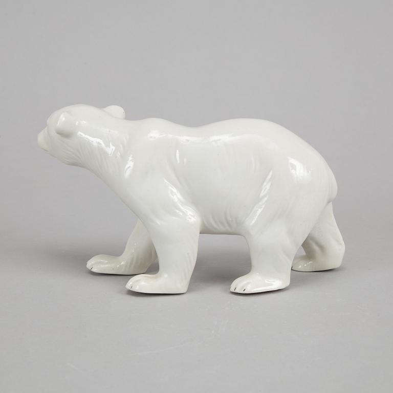 Five ceramic polar bears.