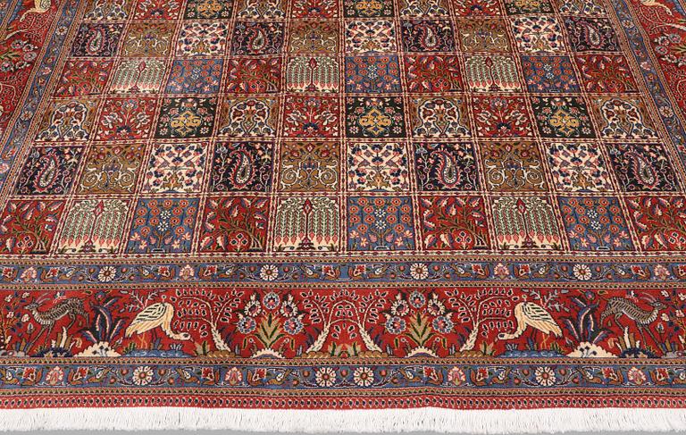 A Moud part silk carpet, 354 x 252 cm.