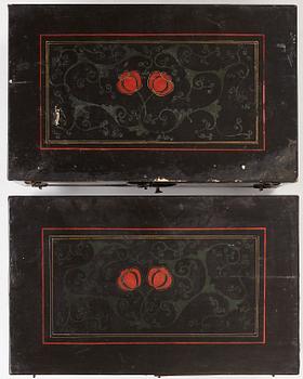 A lacquered cabinet, in two sections, Qing dynasty, 19th Century.