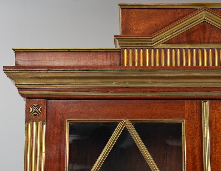 A pair of Russian mahogany and brass-mounted Jacob-style bibliothèques, modern with old parts.