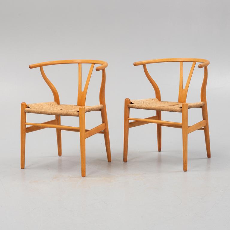 Hans J. Wegner, a pair of model CH-24 chairs, Carl Hansen &  Søn, Denmark.