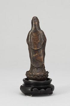 A Chinese 18th century bronze figure of Guanyin.