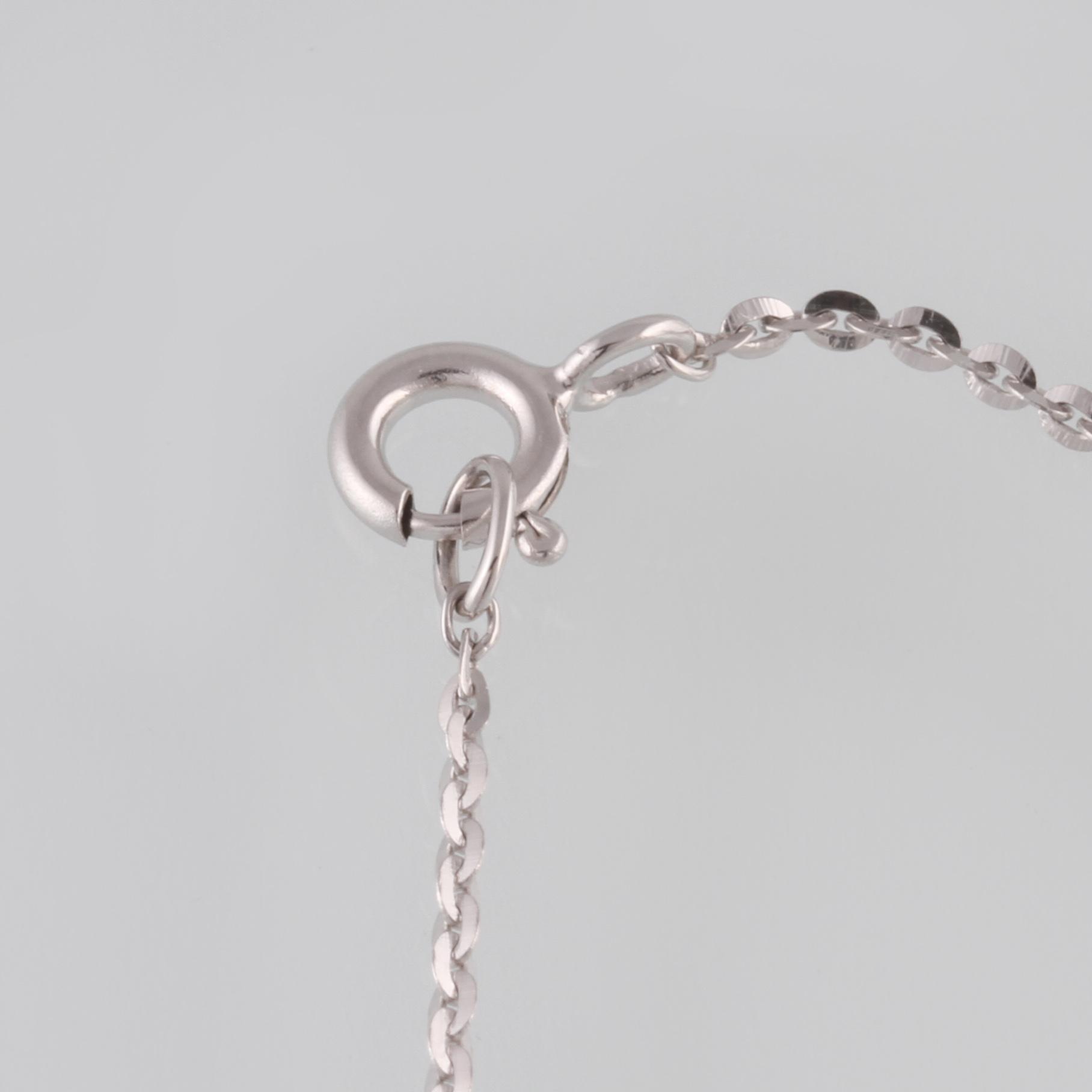 ARMBAND, 18K guld och vitguld med briljantslipade diamanter ca 0.07 ct. Vikt 2,0 gram.