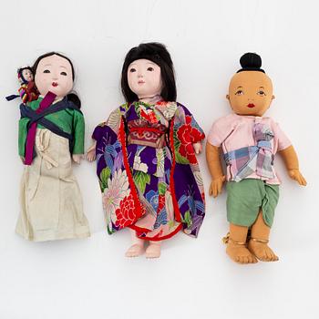 A set with three Asian dolls, early 20th Century.