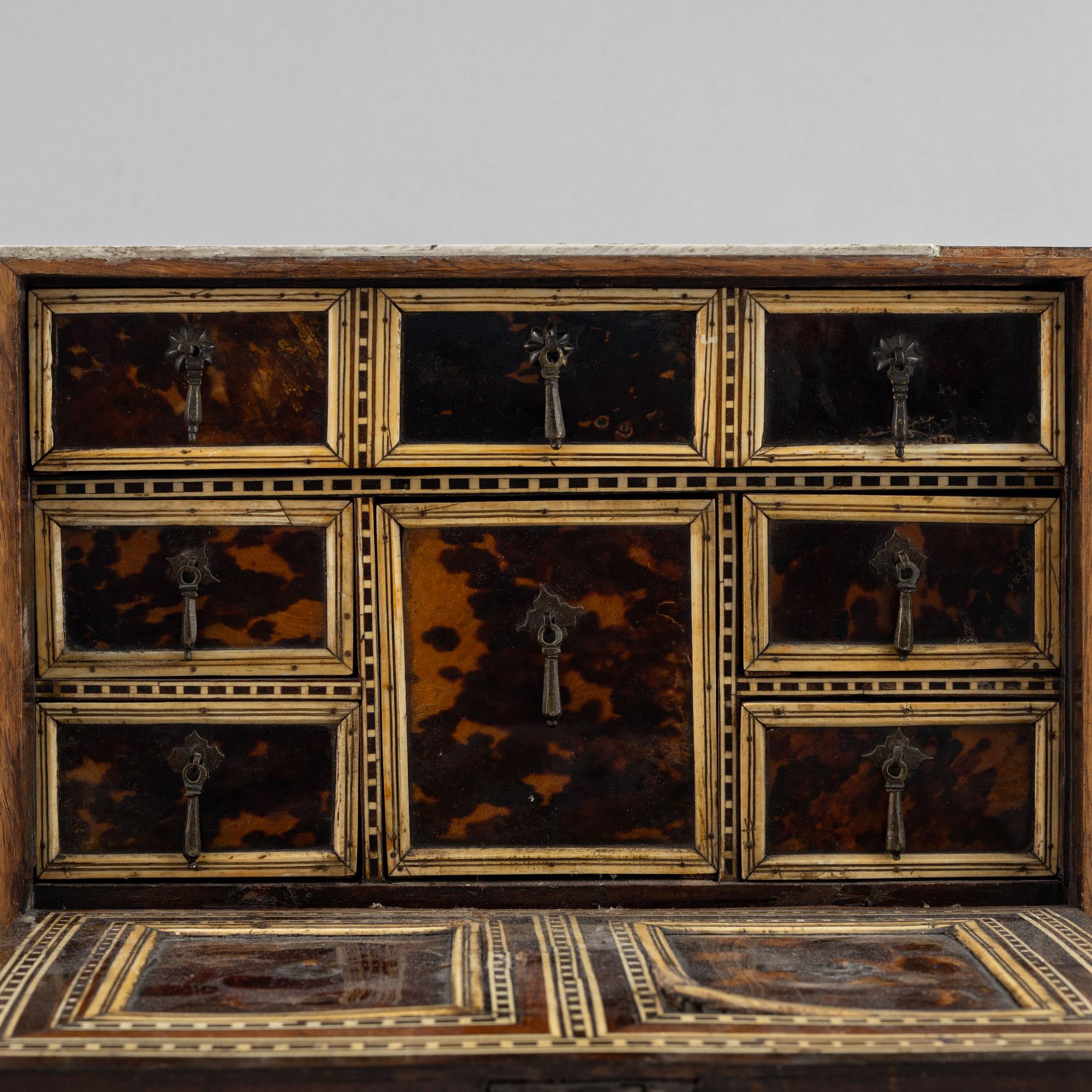 A Spanish colonial bone and tortoise inlayed writing-box, circa 1700.