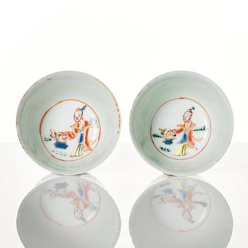 A pair of famille rose miniature cups with stands, Qing dynasty, 18th Century.