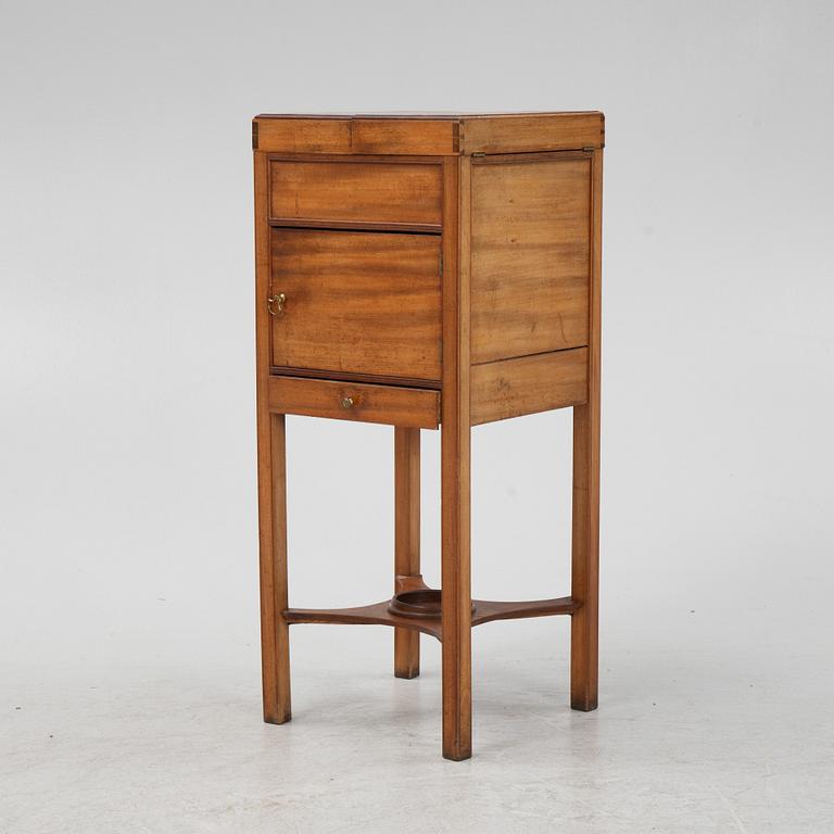 A mahogany shaving stand, 19th Century.