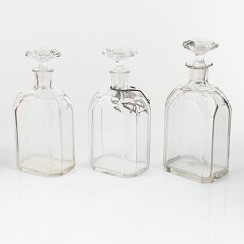 A box with three glass bottles, first half of the 19th Century.