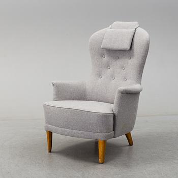 A 'Farmor' easy chair by Carl Malmsten, late 20th century.