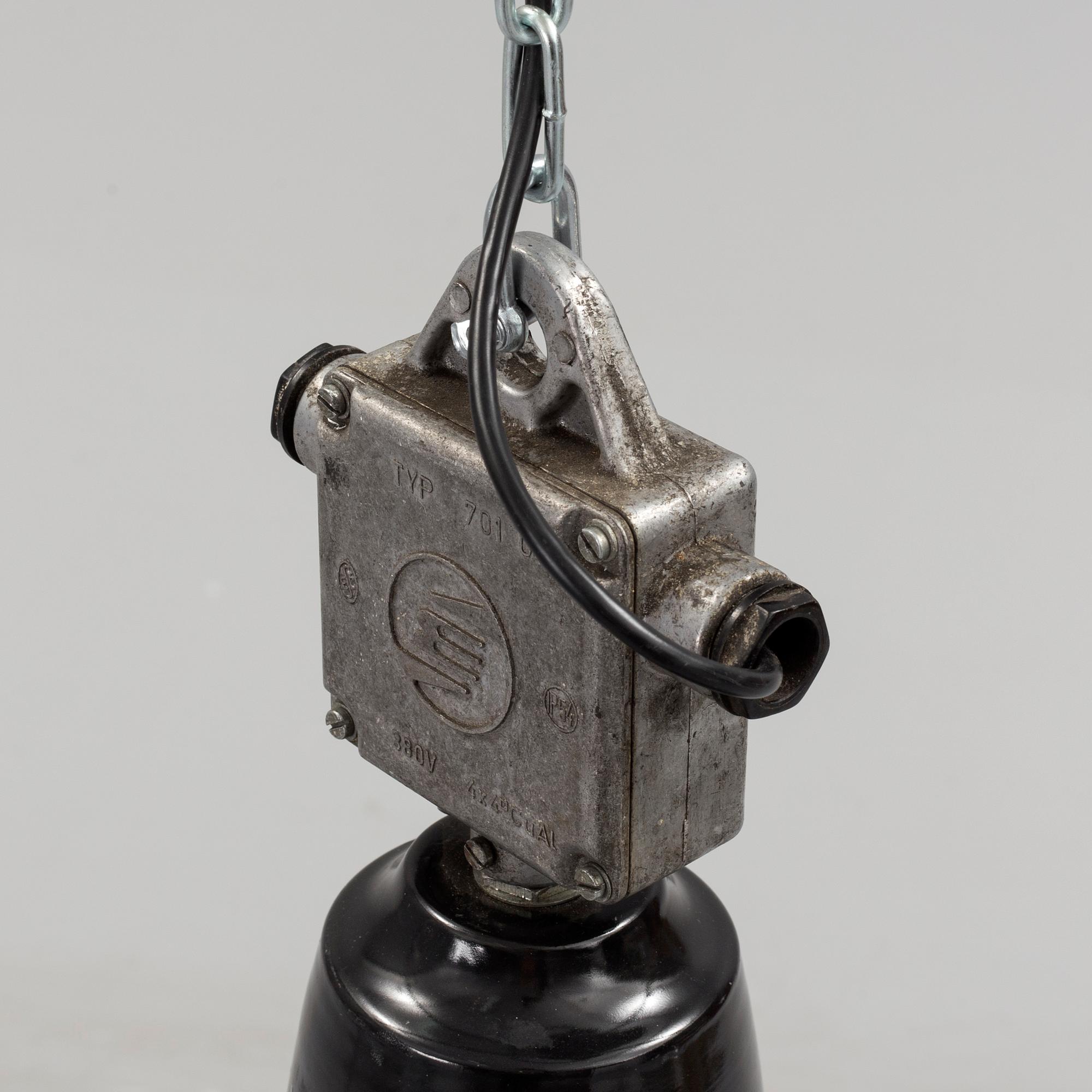 A mid 20th century metal ceiling light. Height ca 55 cm.