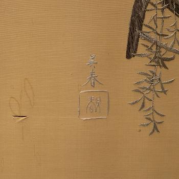 A Japanese silk embroidered four panel folding screen, first half of the 20th century.