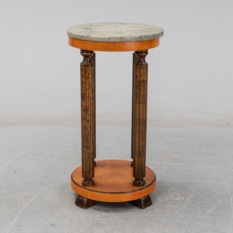 A stone top pedestal, 1920's/30's.