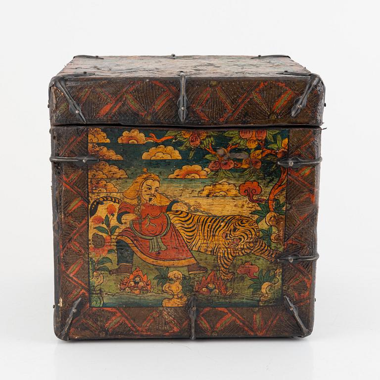 A Tibetan patinated lacquered wooden box, 20th century.