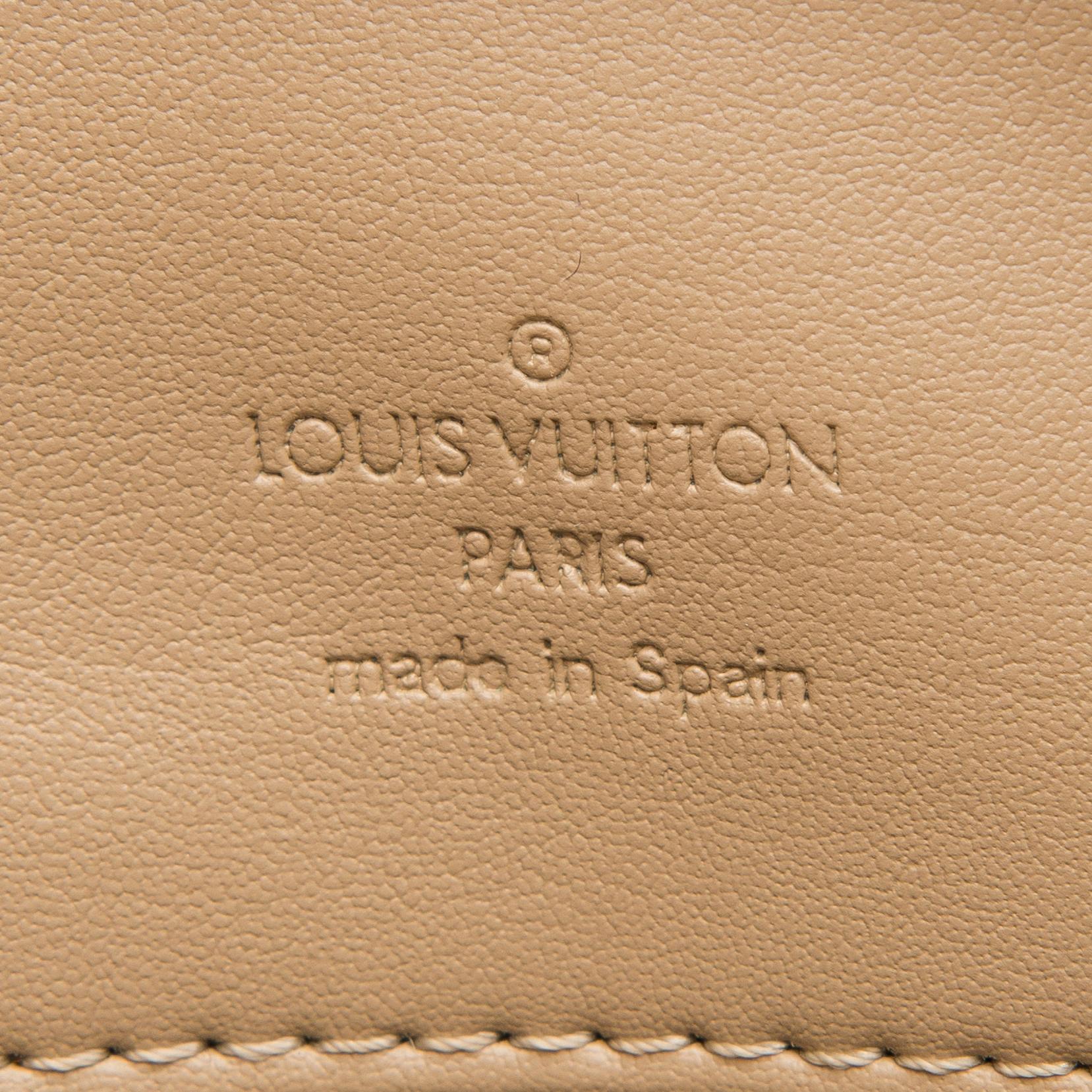 A Monogram Vernis Houston Bag.