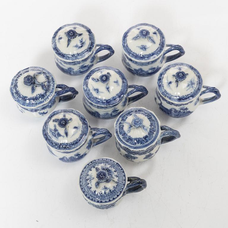 A group of eight Chinese blue and white porcelain custard cups with covers, Qing dynasty, Qianlong (1736-95).