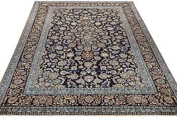 A Keshan carpet, c. 350 x 250 cm.