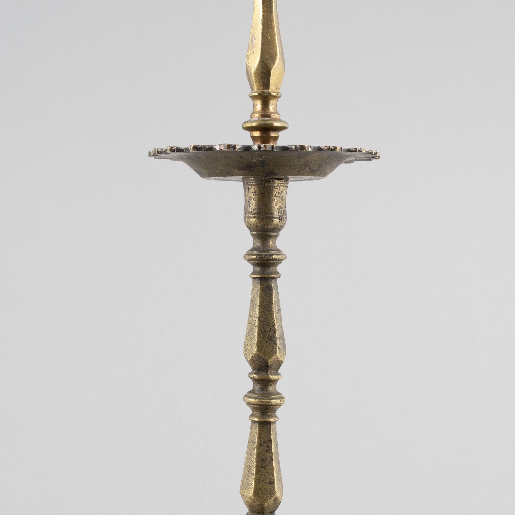 A Baroque-style floor candle stick, around 1900.