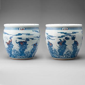 948. A pair of massive Chinese blue and white and red basins, 20th Century.