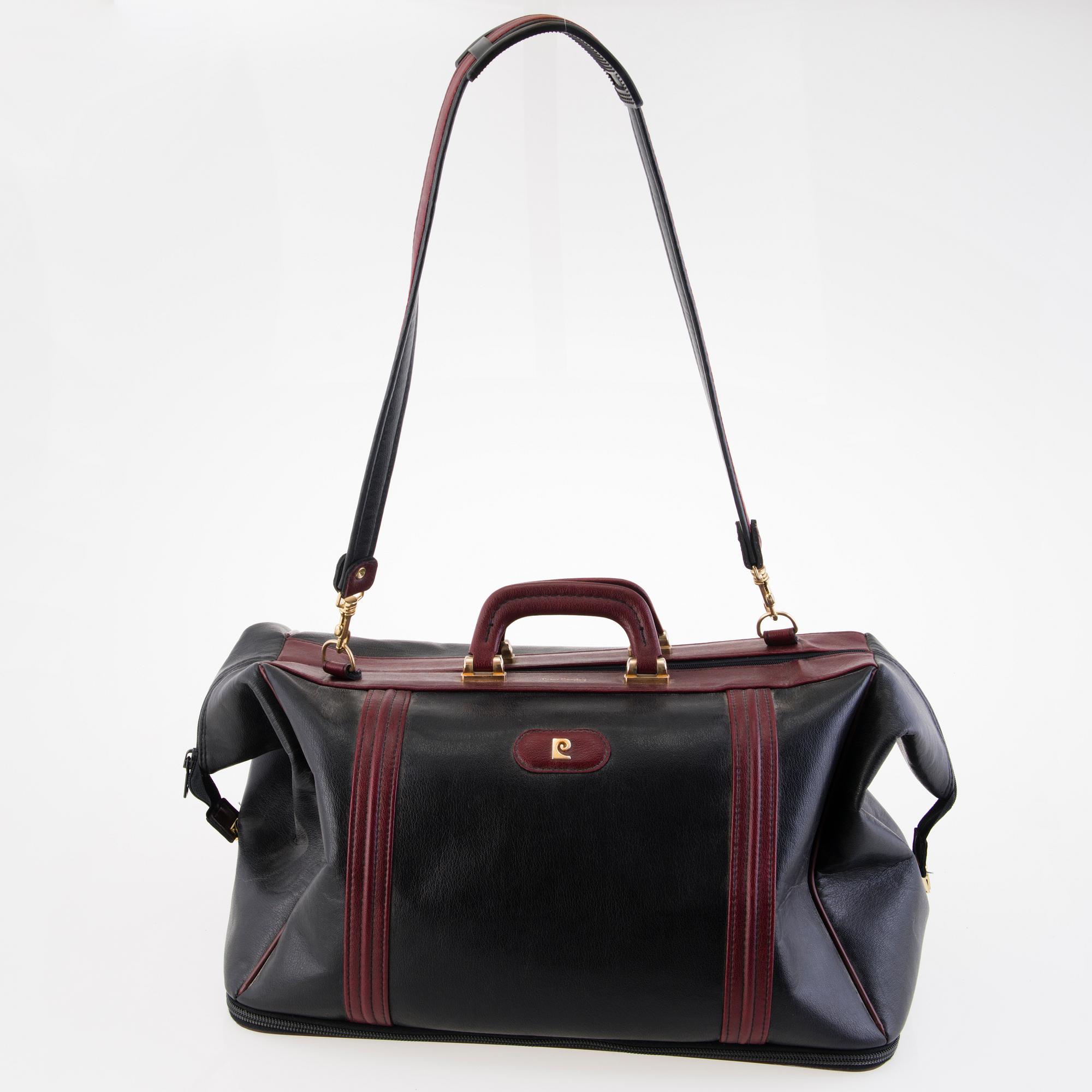 PIERRE CARDIN Vintage Black and burgundy Leather Travel Bag. Bukowskis