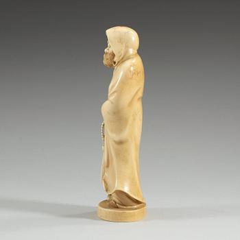 A Japanese ivory figure of a deamon, Meiji period (1868-1912).