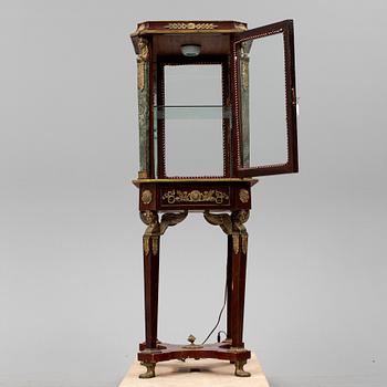 An Empire style cabinet, mid 20th Century.