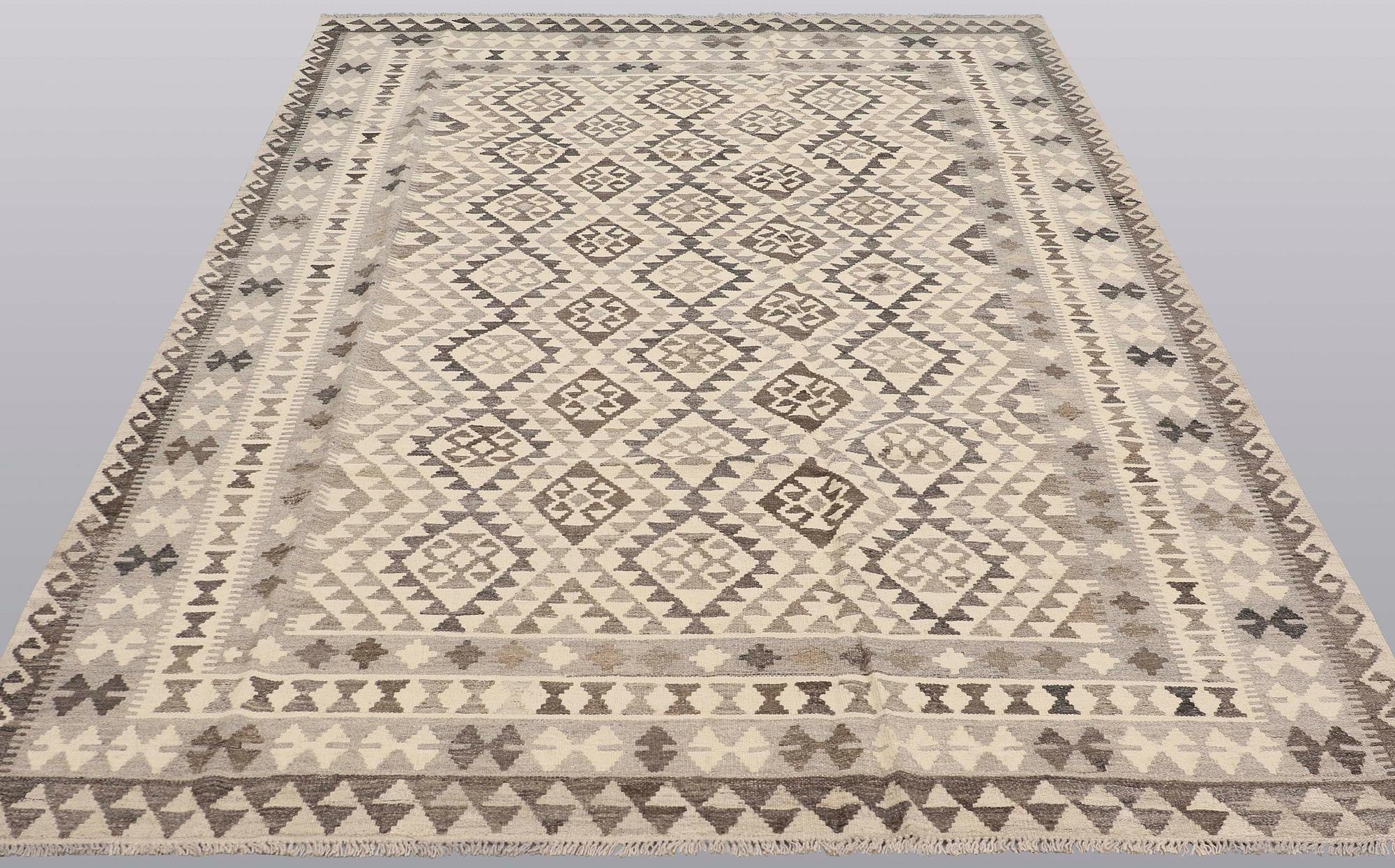 A Kelim carpet, 295 x 200 cm.
