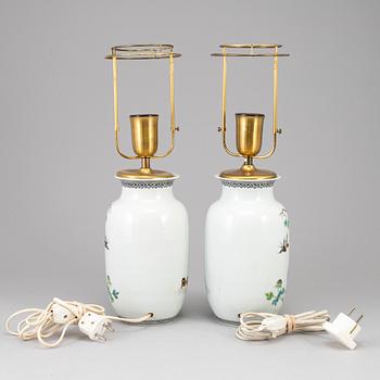 A pair of Chinese famille rose vases, turned into table lamps, 20th century.