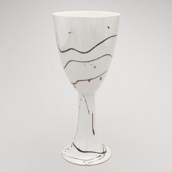 A porcelain goblet signed IL/ML, Arabia.