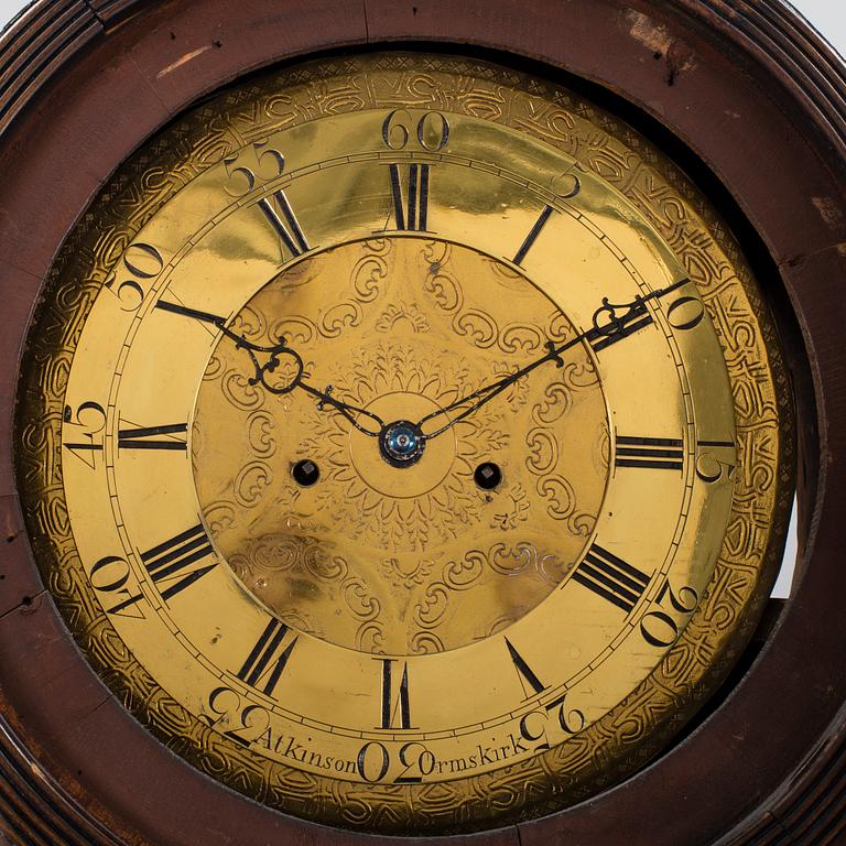 A 19th century Longcase Clock with arched brass dial inscribed Thomas Atkinson, Ormskirk, England.