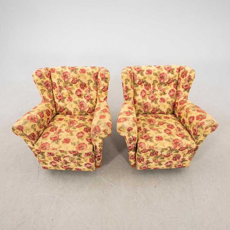 A pair of easy chairs from the middle of the 20th century.
