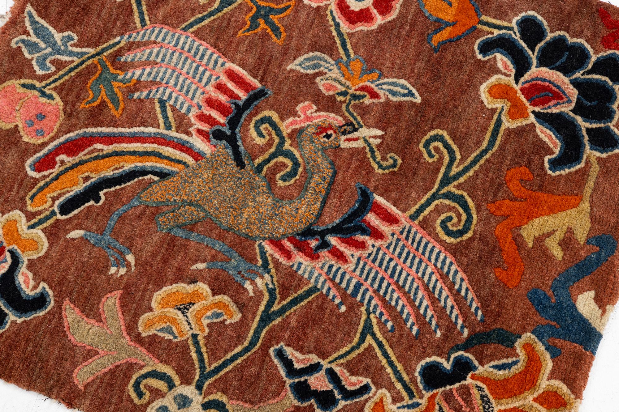 An antique 'Khagangma' rug, Tibet, around 1900. c. 74x63 cm.