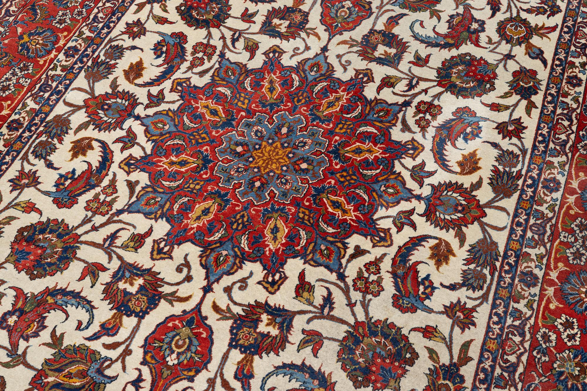 A semi-antique Isfahan carpet, central Persia, c. 314 x 197 cm.