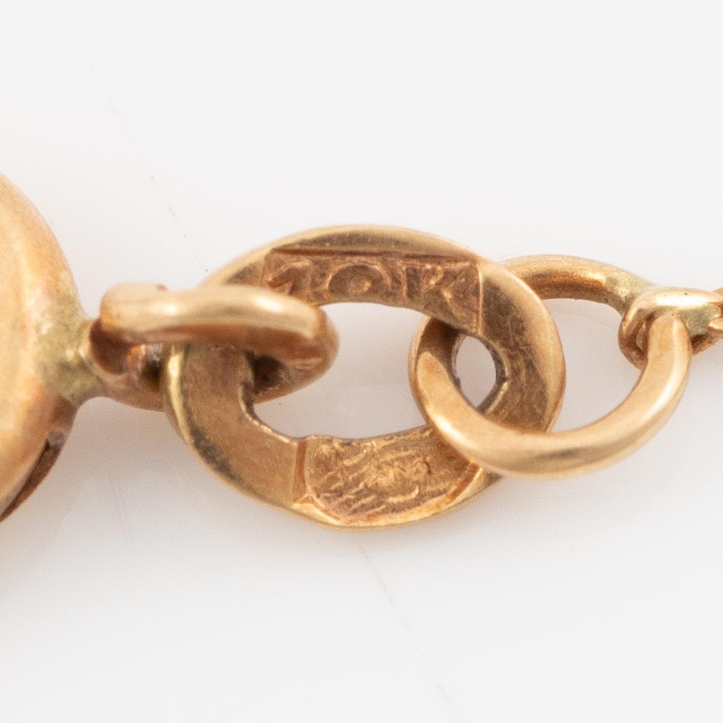 Collier 18K guld och platina med en pärla och rosenslipade diamanter.