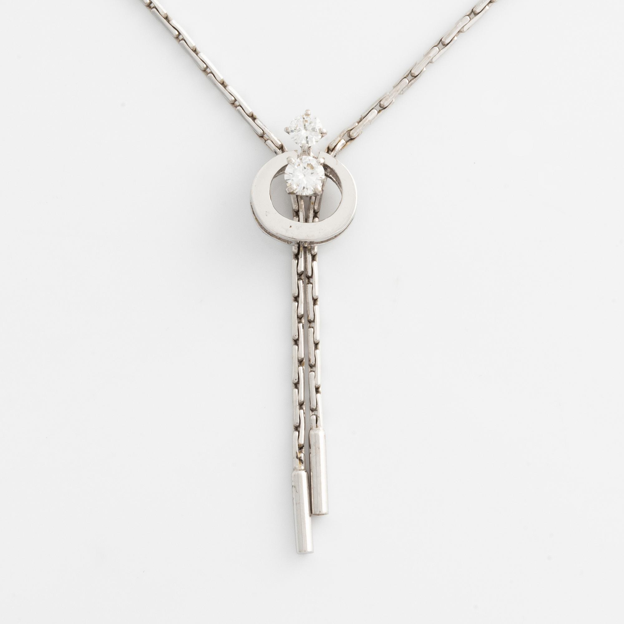 Collier, vitguld med två briljantslipade diamanter.