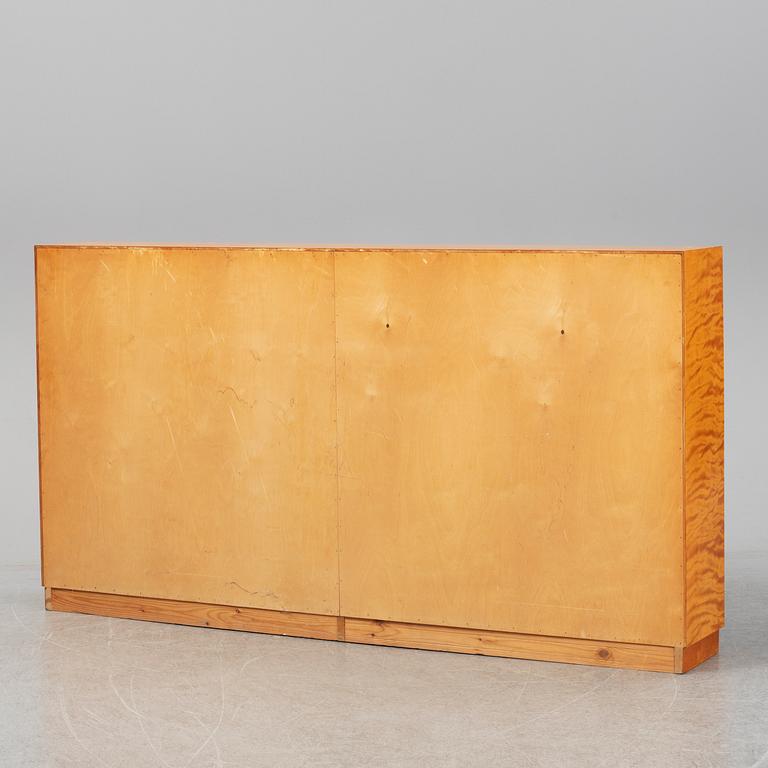 A 1940s birch veneered shelf.