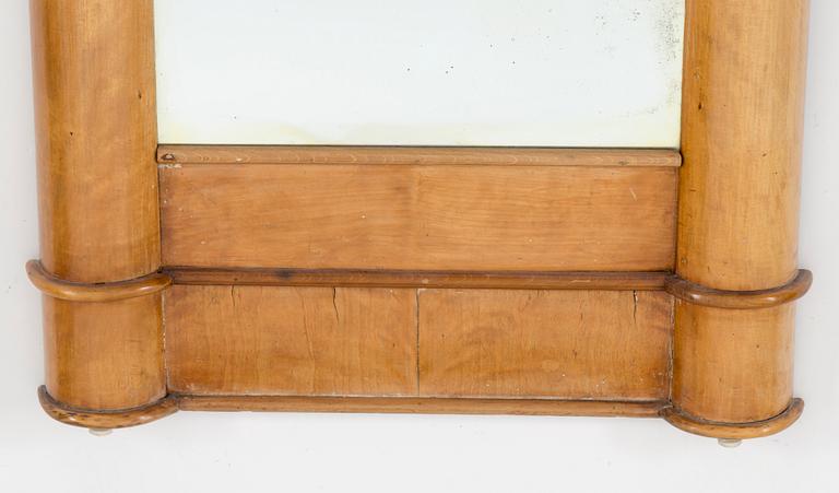 A Swedish Karl Johan mirror veneered with birch.