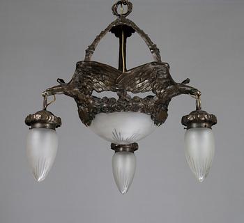 A Jugend style patinated bronze pendant ceiling light from the early 1900s, Böhlmarks, Sweden.