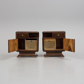 A pair of first half of the 20th century bedside tables.