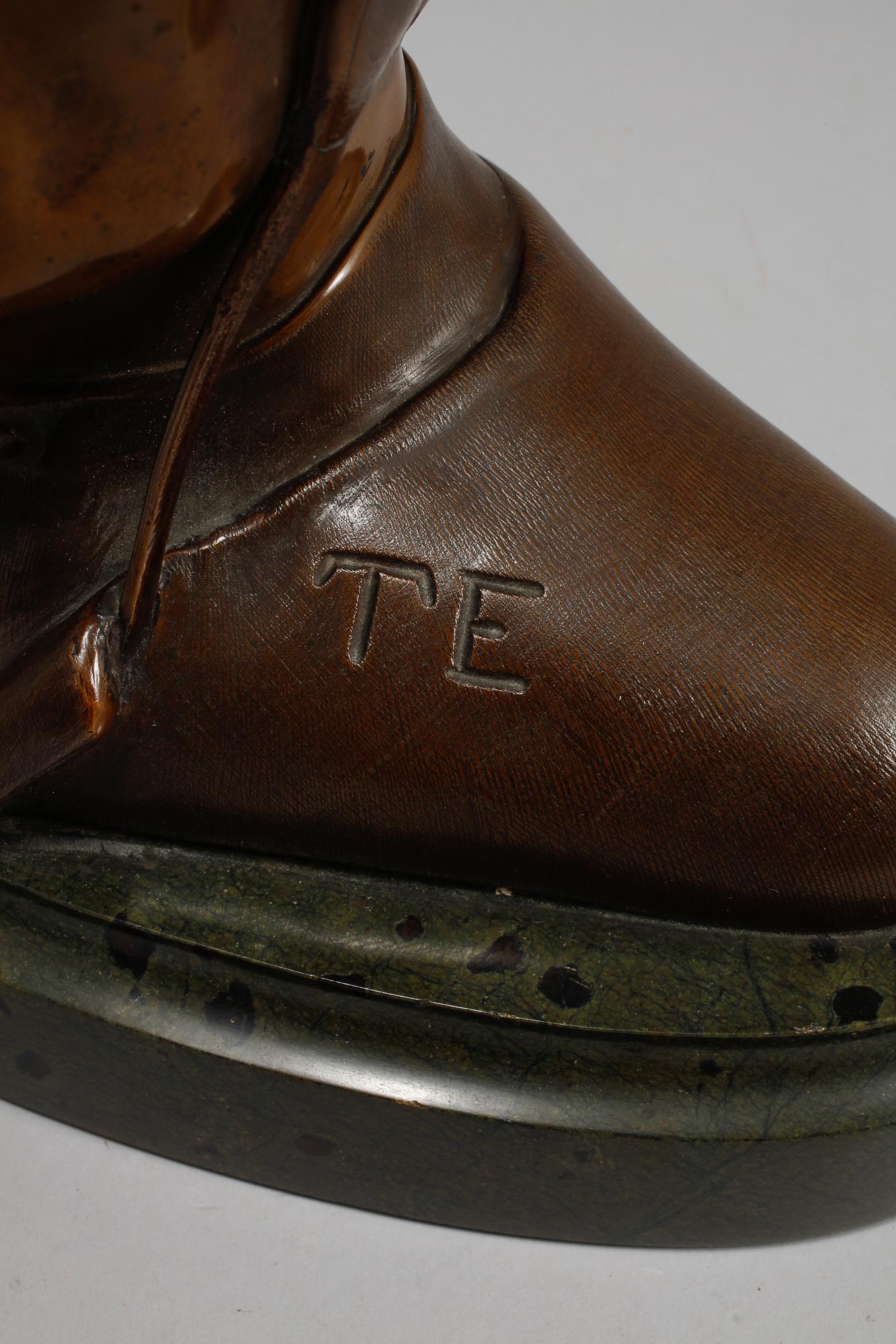 SKULPTUR, patinerad brons och sten, 1900-tal.