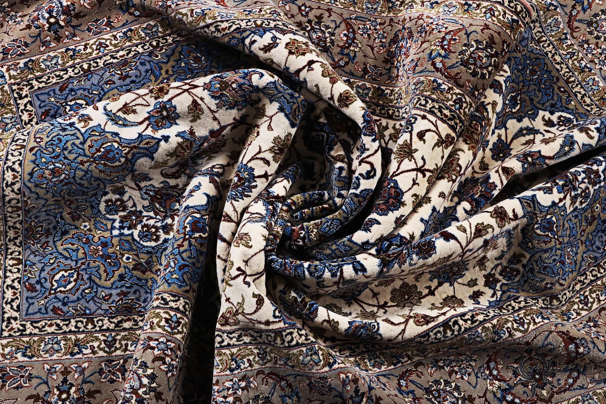 A rug, Esfahan, part silk, ca 245 x 155 cm.