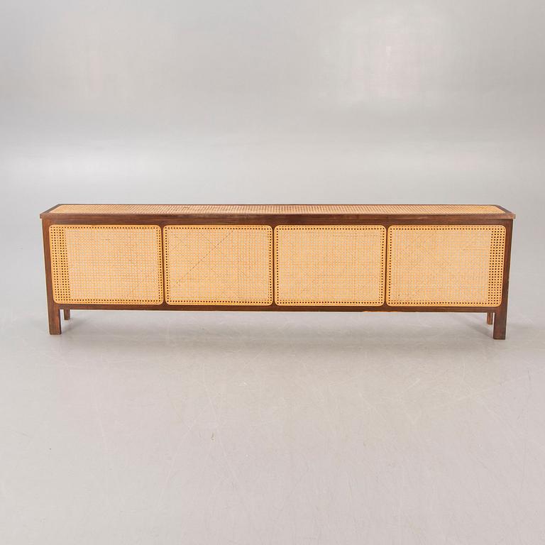 A set of two rattan radiator covers later part of the 20th century.