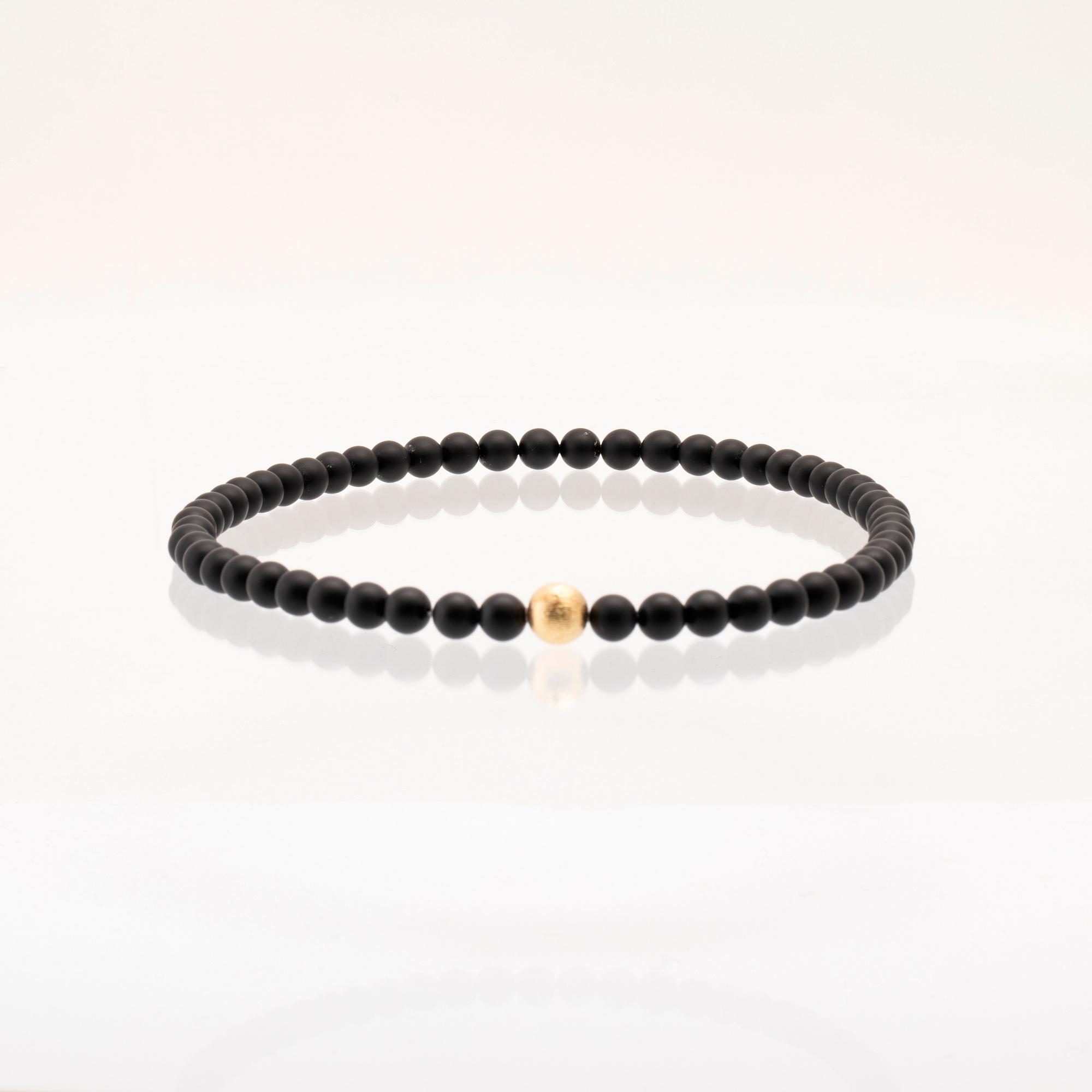 Ole Lynggaard, two necklaces and clasp in 18K gold.