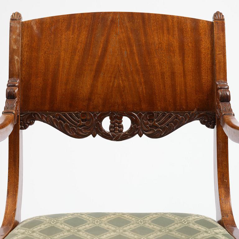 A pair of Baltic / Russian mahogany Empire armchairs, first part 19th century.