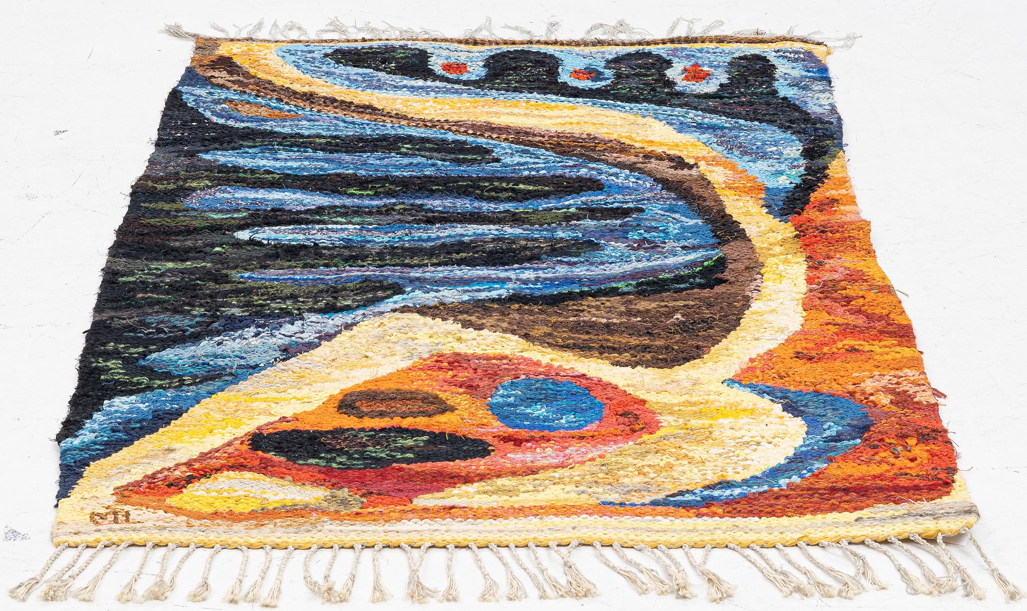 Maj Larsson, a wall hanging, rag rug, signed ML, c. 135 x 90 cm.