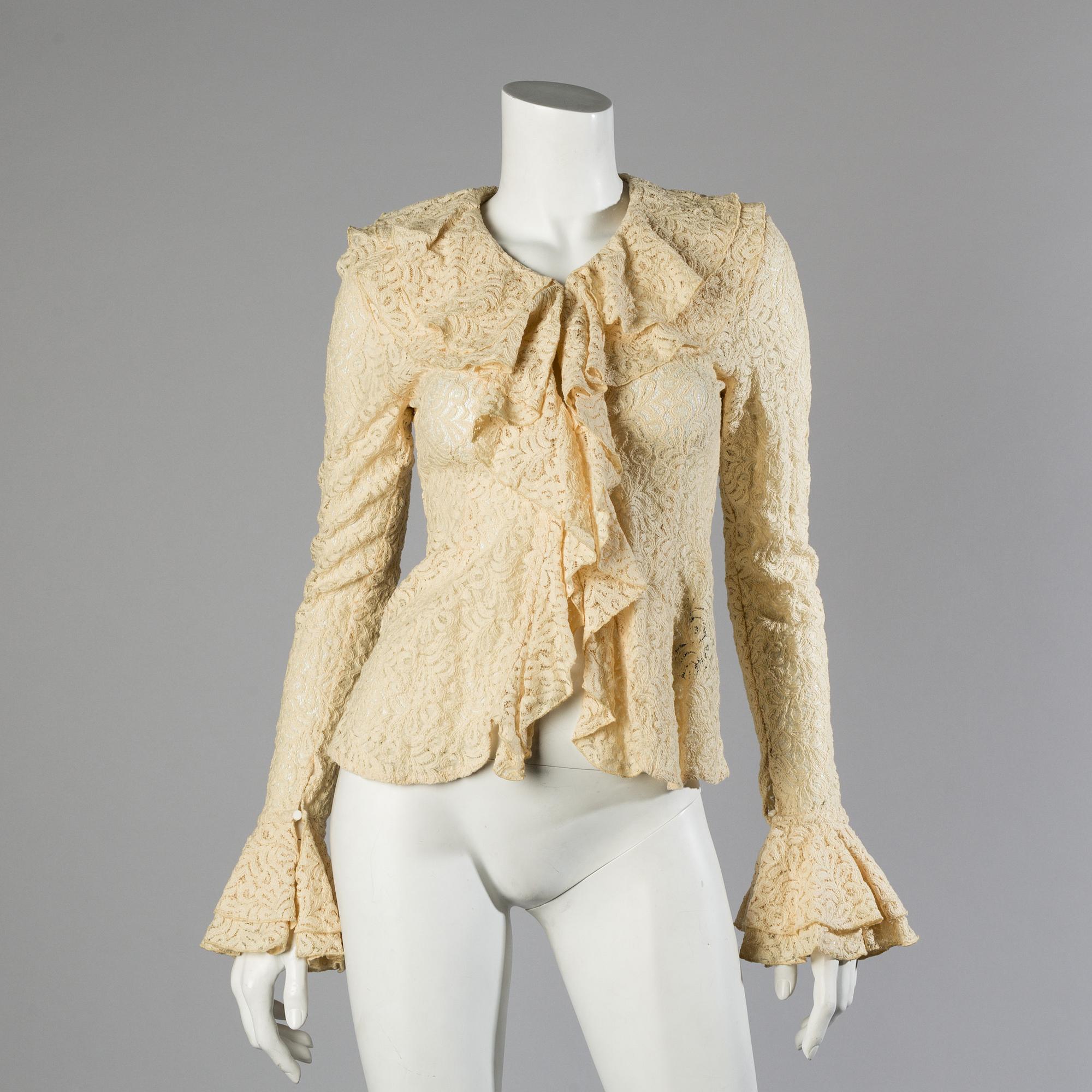 A wool/alpaca jacket by Ralph Lauren and two blouses.