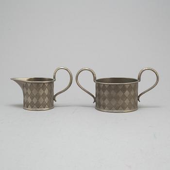 FIRMA SVENSKT TENN, a pewter sugarbowl and creamer Model nr 170, Stockholm 1927.