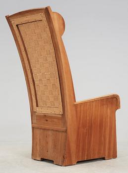 A stained pine armchair attributed to either Axel Einar Hjorth or David Rosén, Nordiska Kompaniet, ca 1932.