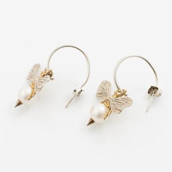 Maria Nilsdotter, a single earring, "rain earring" and a pair, silver with pearls and quartz.