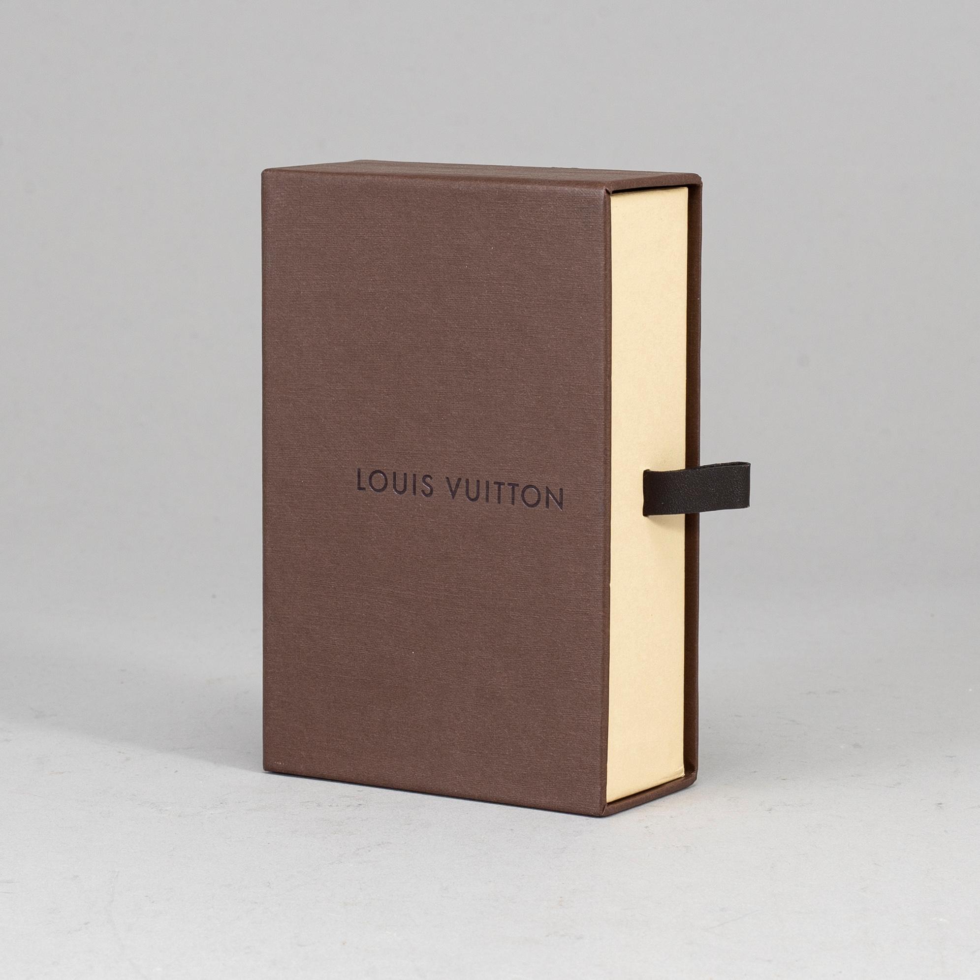 A Louis Vuitton money clip.