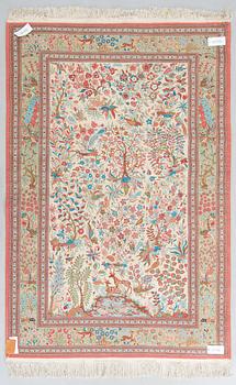 A silk Qum rug, central Persia, c. 210 x 138 cm.